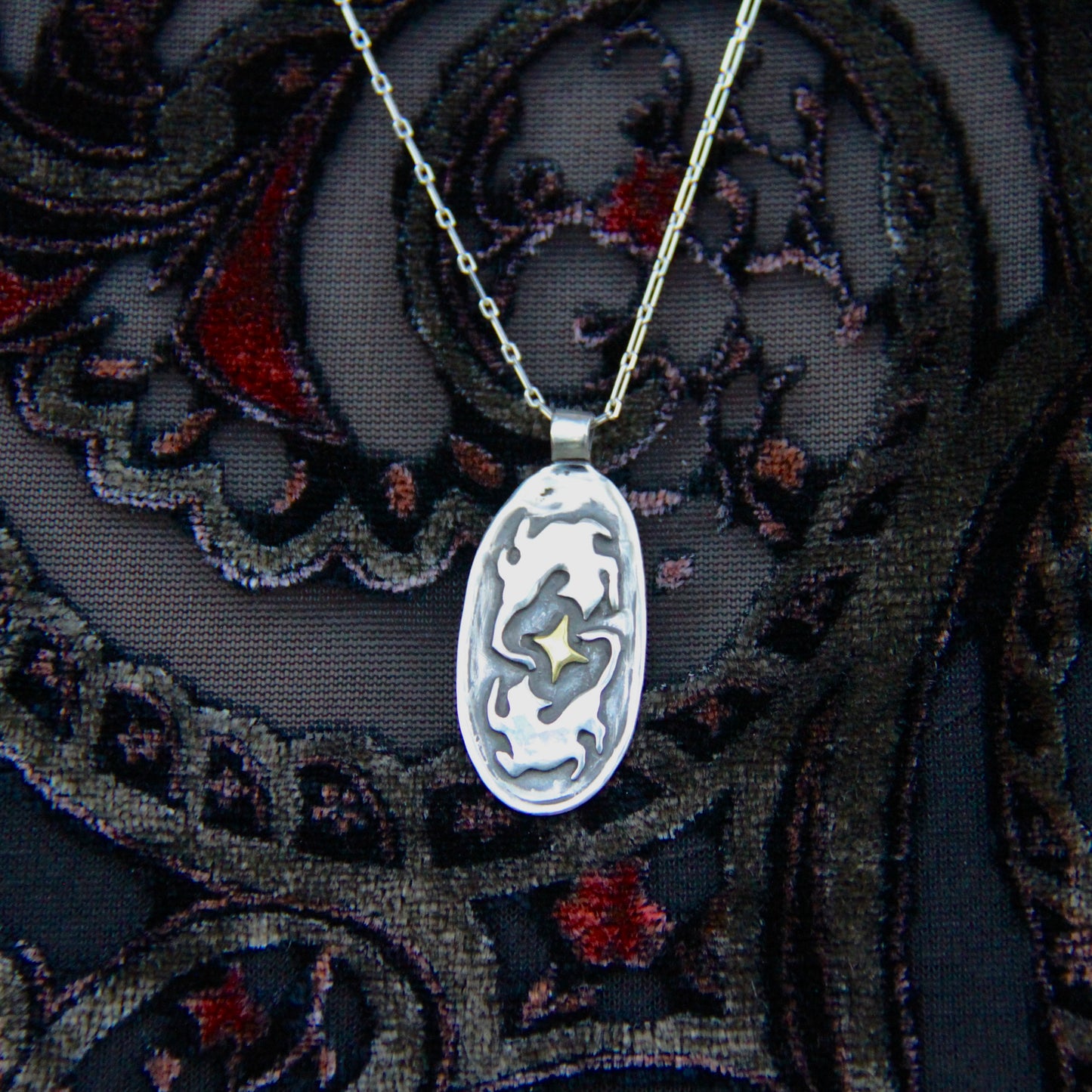 Dancing cats pendant