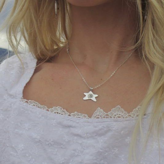 Swirly star necklace